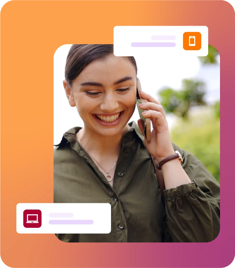 Lady walking outdoors on a call with a mobile phone smiling