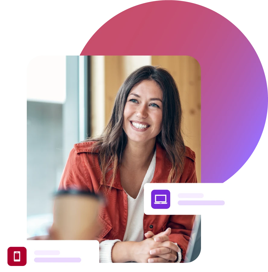 Lady smiling during a meeting with laptop on the table